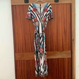 Lightweight jumpsuit with geometric and floral print.